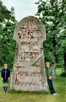 Picture of a rune stone and two children