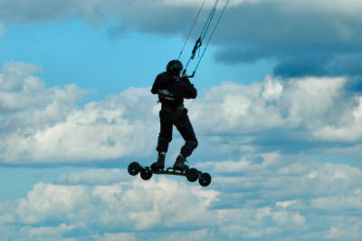 Picture of a jumping kite surfer