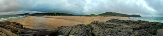 Picture of the beach, dunes and cliffs at a bay