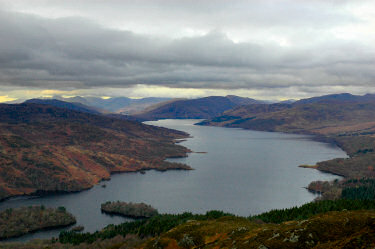 Picture of a view over a loch surrounded by mountains