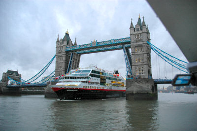 Picture of the Tower Bridge opening to let a cruise liner pass